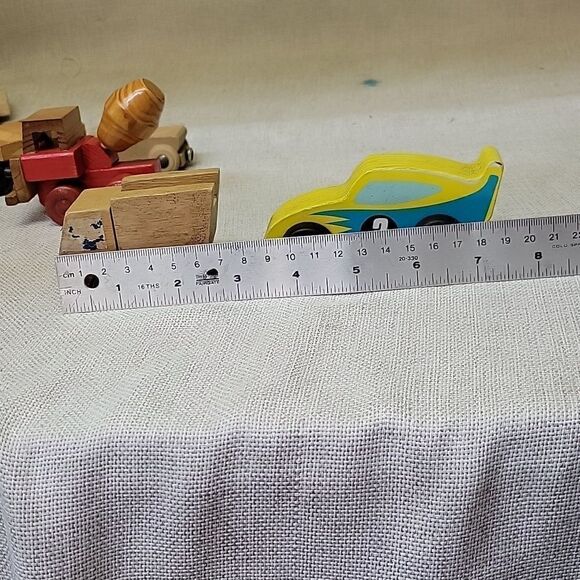 Assorted small wood vehicles..train, dumo truck, race cars... - Picture 8 of 8